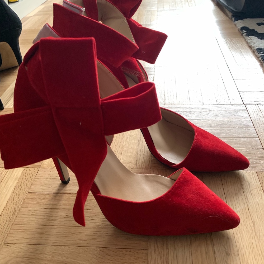 Red heels with bow, size 8